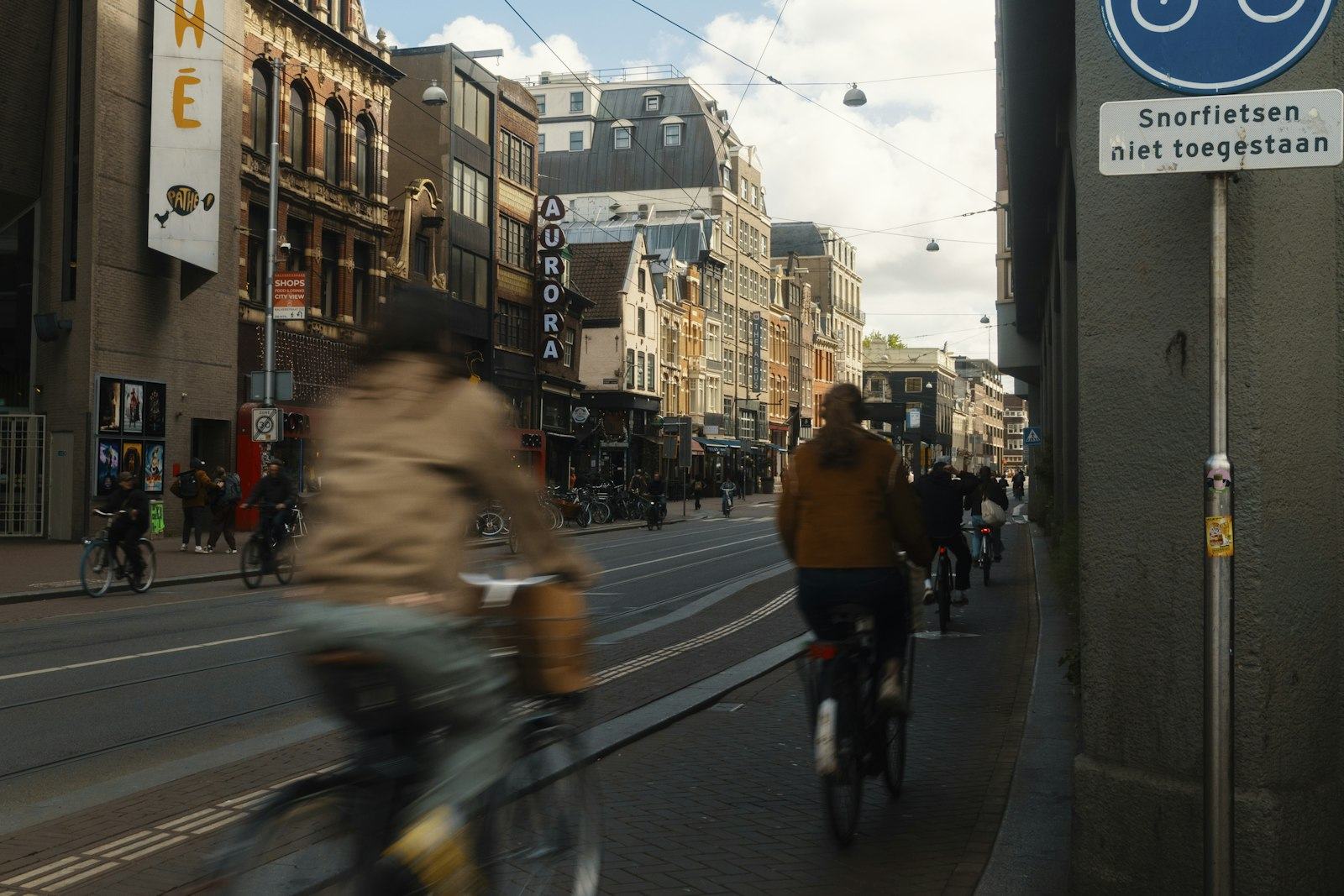 Cyclists commuting through a busy city street